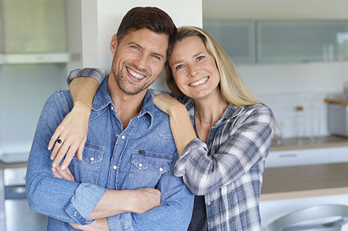 Image Text: 500x332_0007_Portrait of cheerful middle-aged couple at home