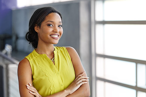 Image Text: 500x332_0010_Portrait of a confident black businesswoman at work in her glass office