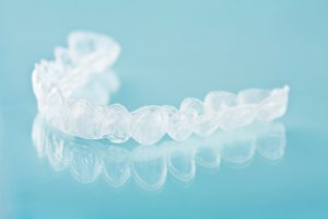 Image Text: Cleaning Crystals Invisalign